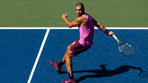 Carlos Alcaraz Wows US Open Crowd with Audacious Behind-the-Back Trick Shot