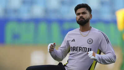 Shreyas Iyer looking towards the sky after scoring a century