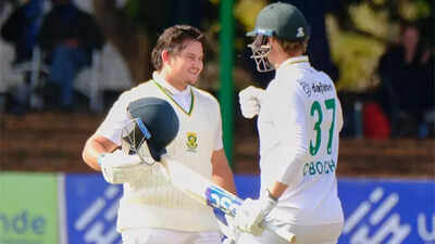 Lhuan-dre Pretorius celebrates with Corbin Bosch