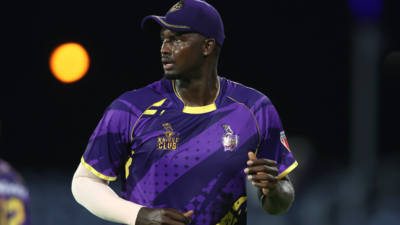Jason Holder looking surprised after the bail stayed on the stumps.