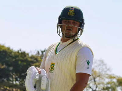 Lhuan-dre Pretorius celebrates his record-breaking century against Zimbabwe.